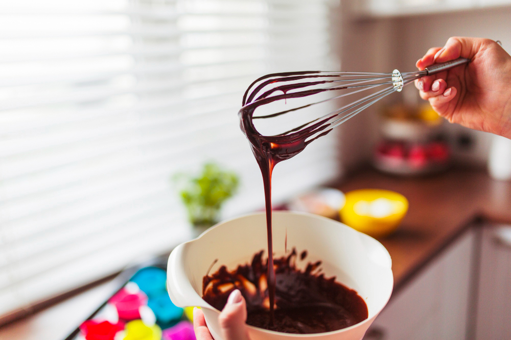 crop-hands-mixing-batter-with-whisk